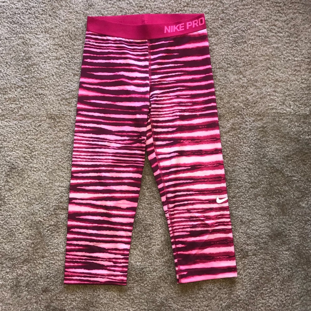 Hot pink zebra print Nike leggings